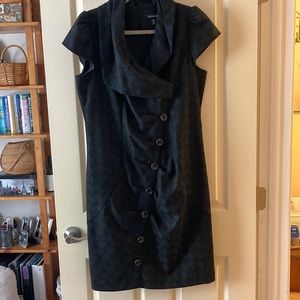 Le château black coat dress with interesting button design and cap sleeve